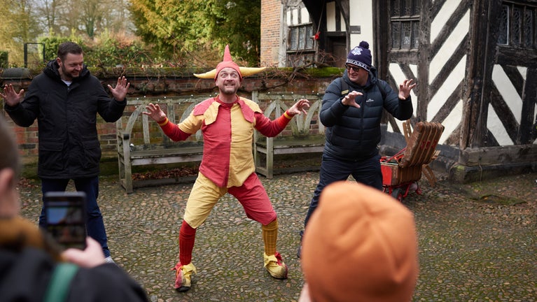 Jester entertains the crowd with mischief and merriment galore